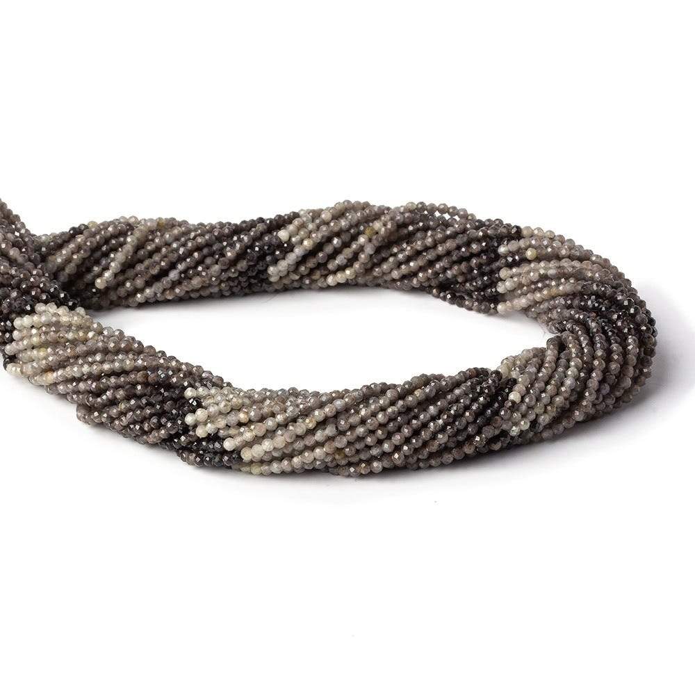 Twisted loop of multi-tonal grey and brown sapphire micro-faceted round beads on a white background.