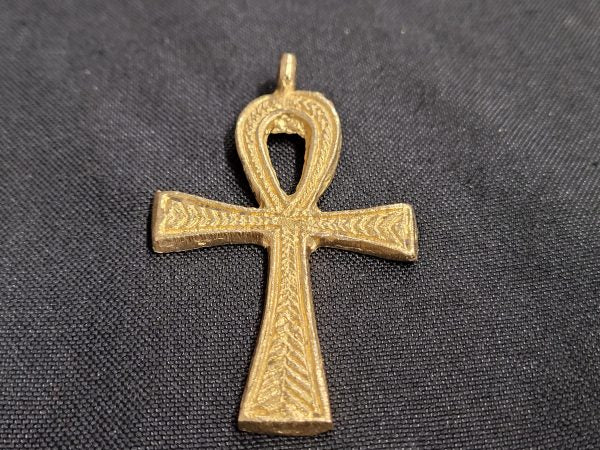 ghana brass ankh pendant front view dark background