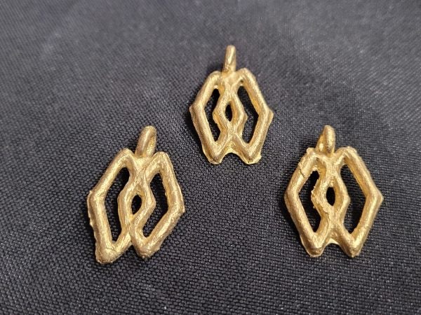 ashanti brass pendant 3 adinkra symbol pendants side view