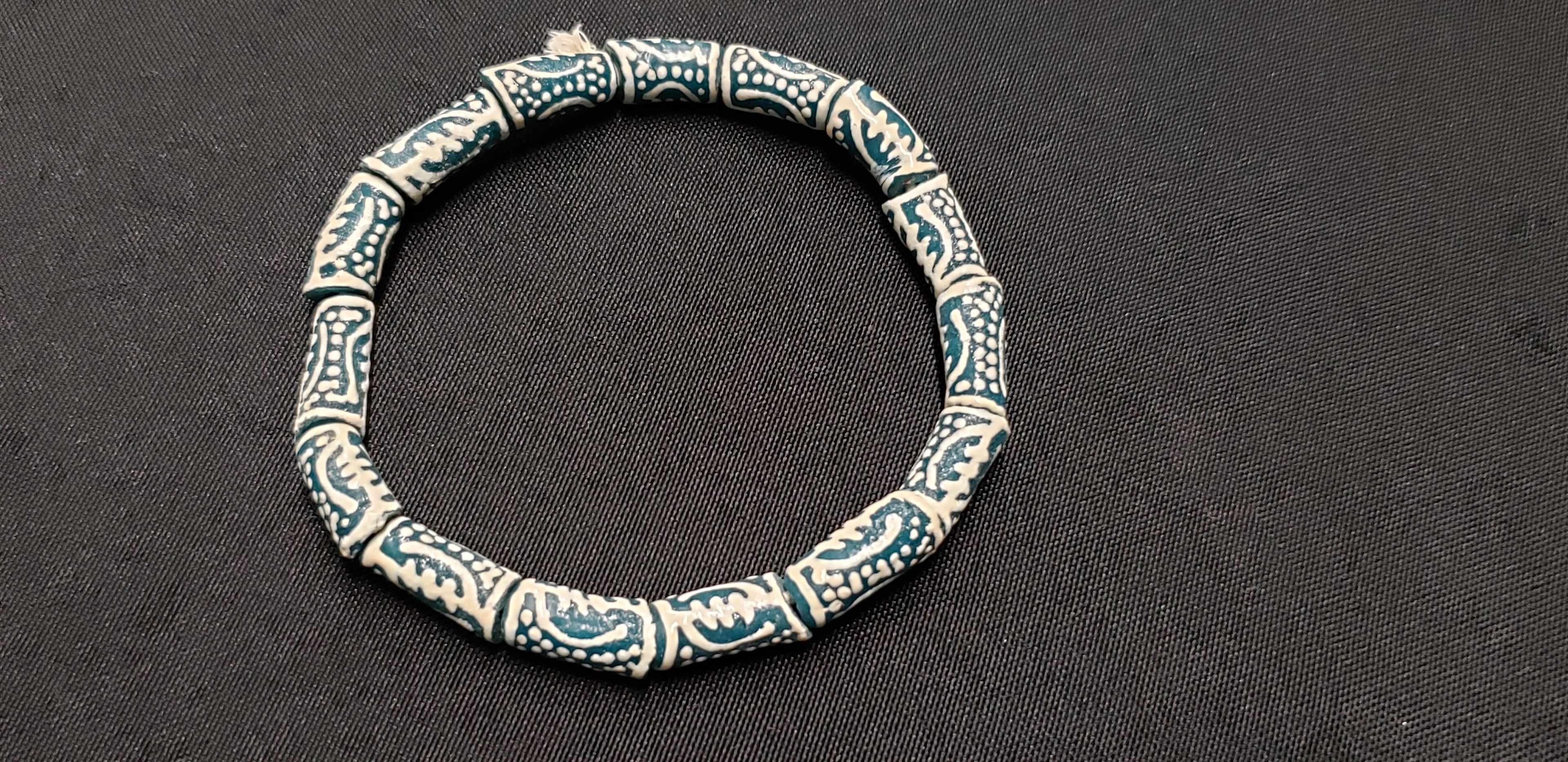 gye nyame african glass beads divine connection detail view