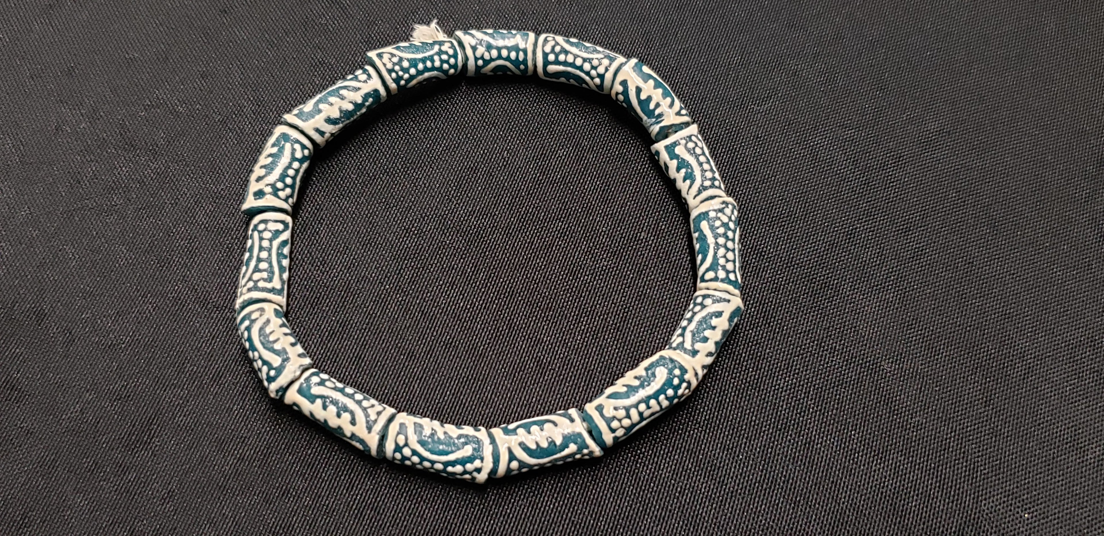 gye nyame african glass beads divine connection strand top view
