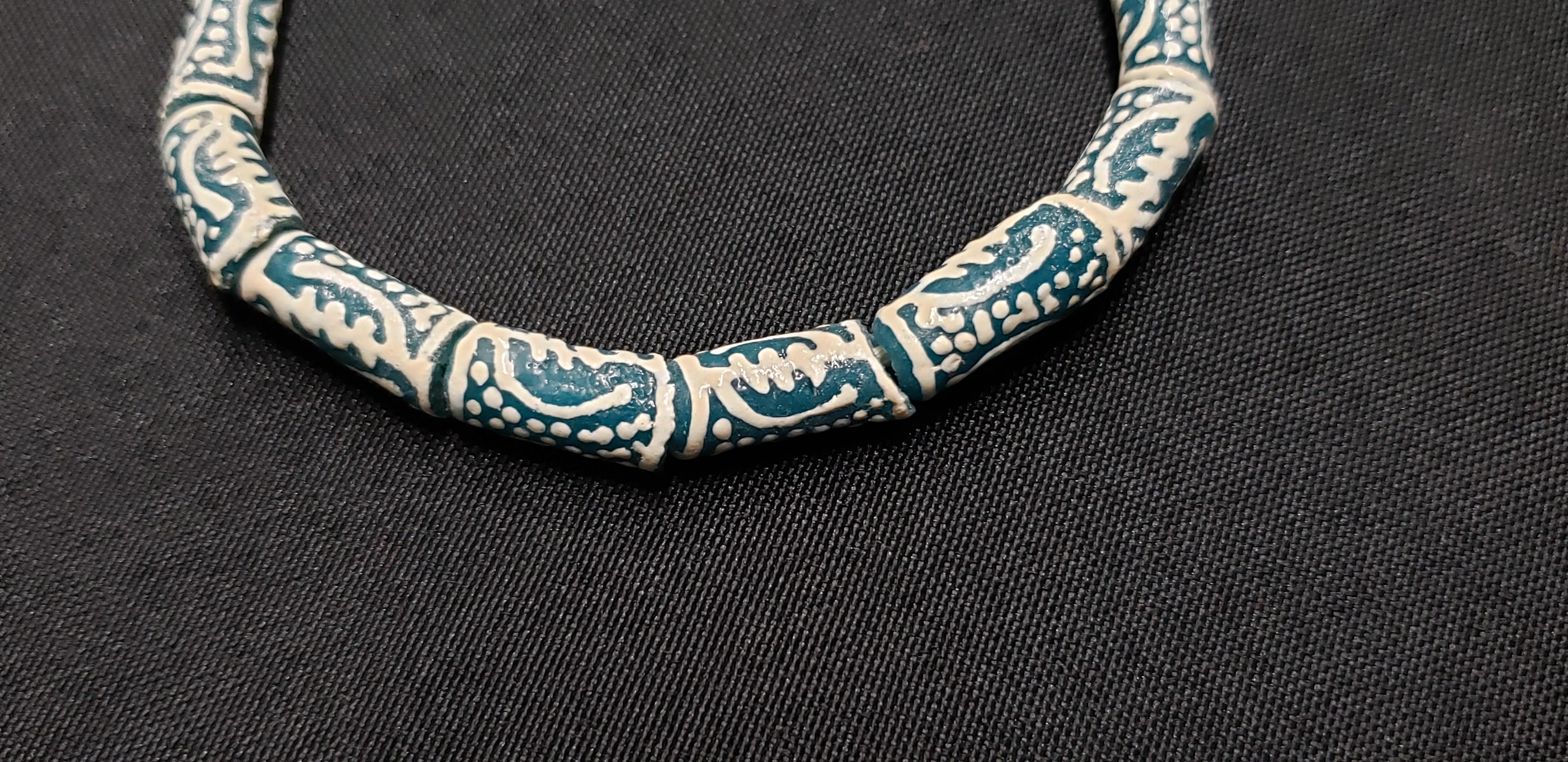 gye nyame african glass beads divine connection side view