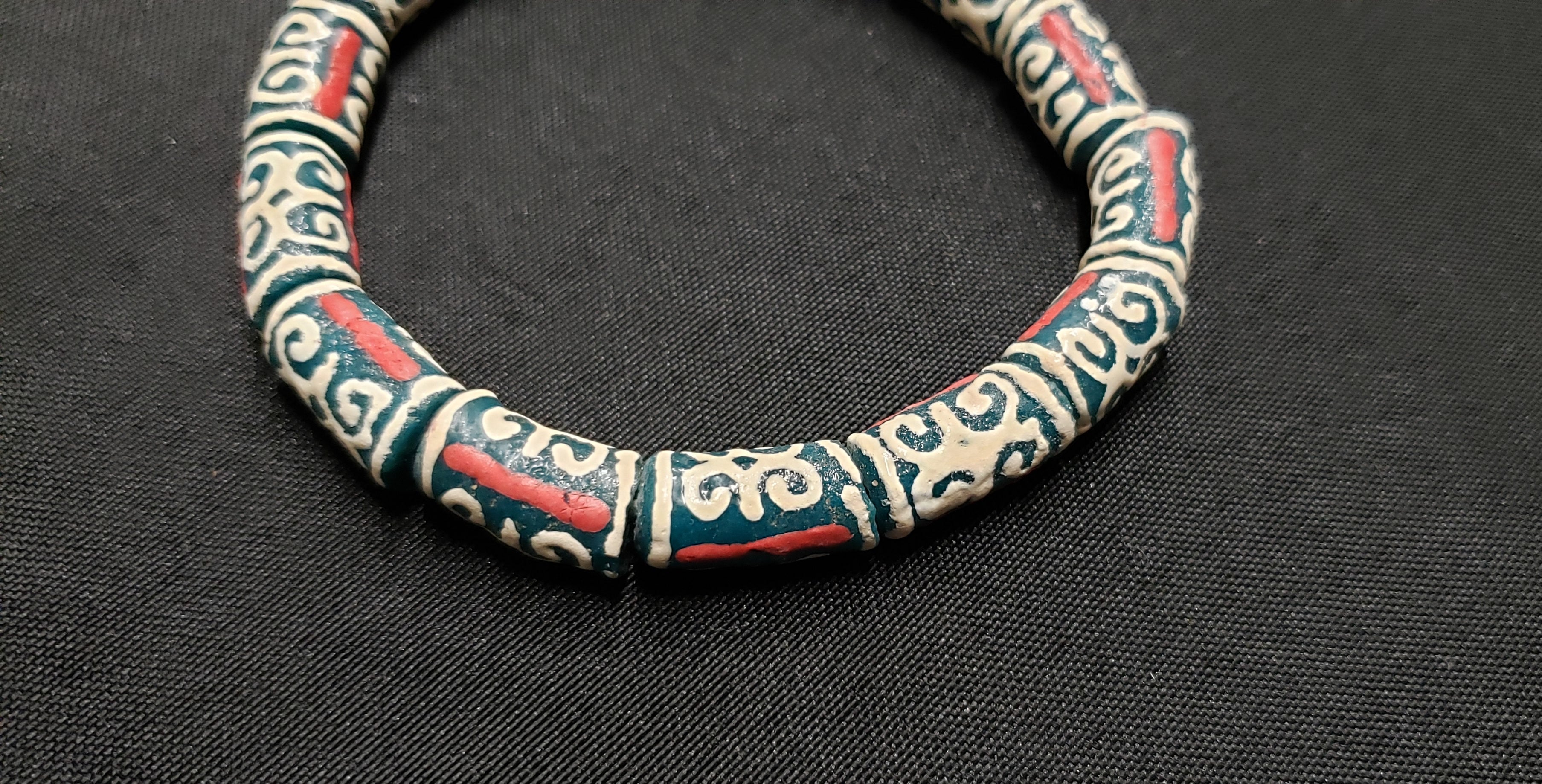 african recycled glass beads humility strength side view