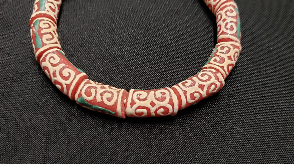 adinkra glass beads AAB#1655 red cream side view