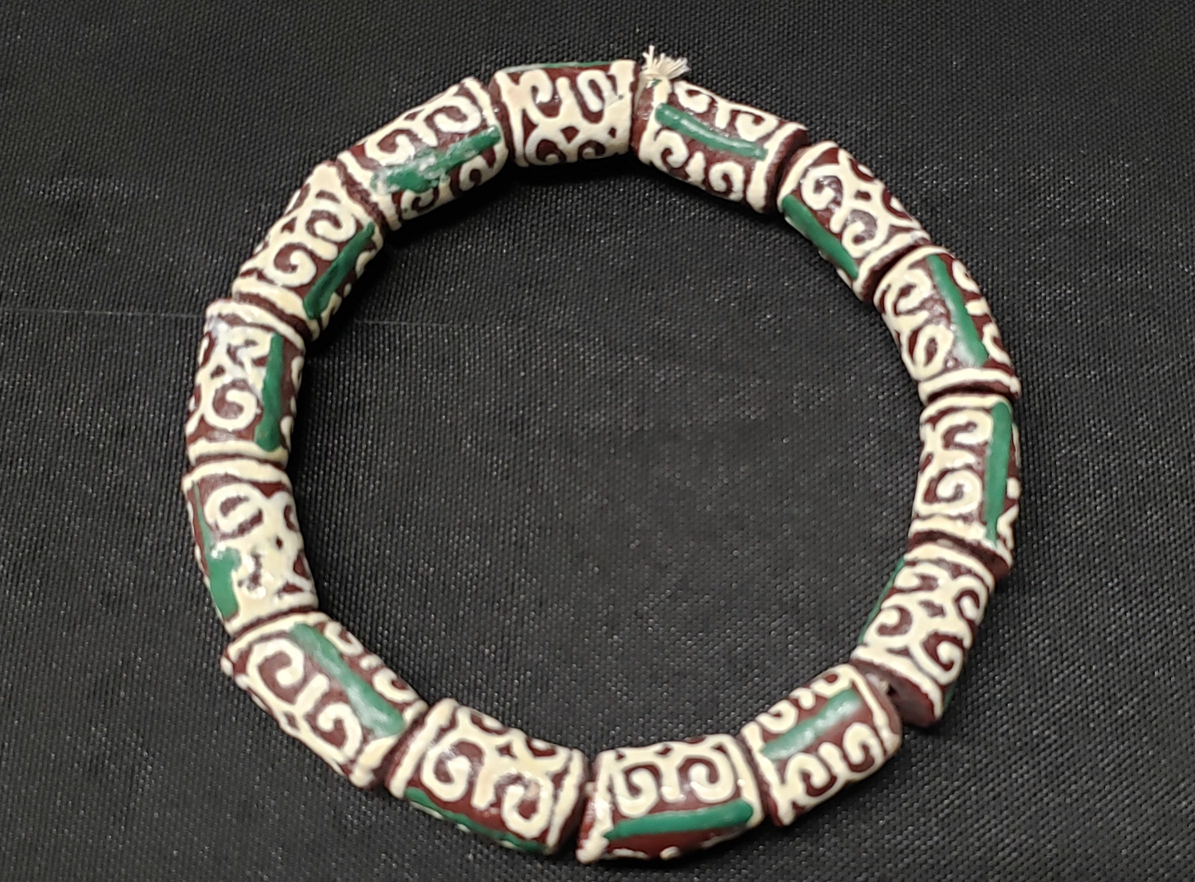 adinkra glass beads AAB#1657 side view