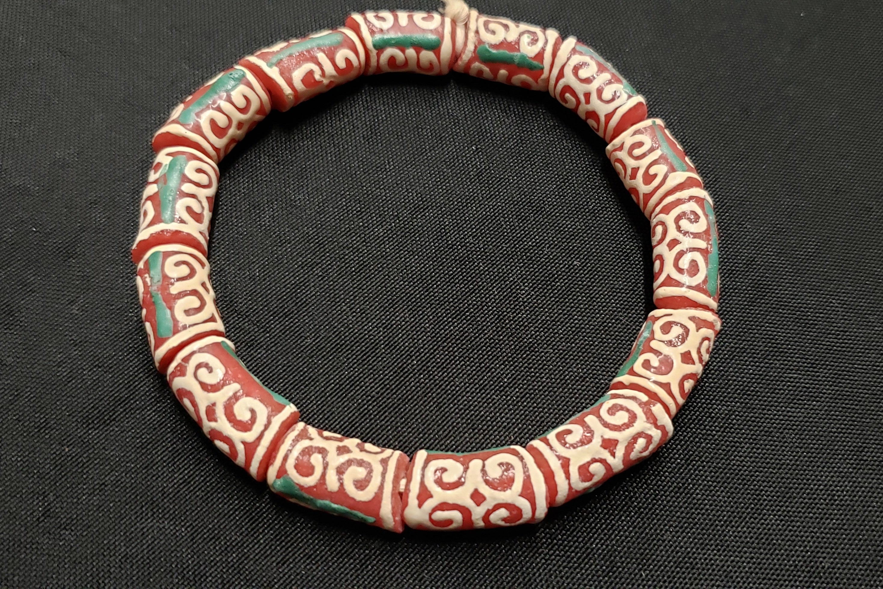 african glass beads ghana dwennimmen adinkra beads strand top view