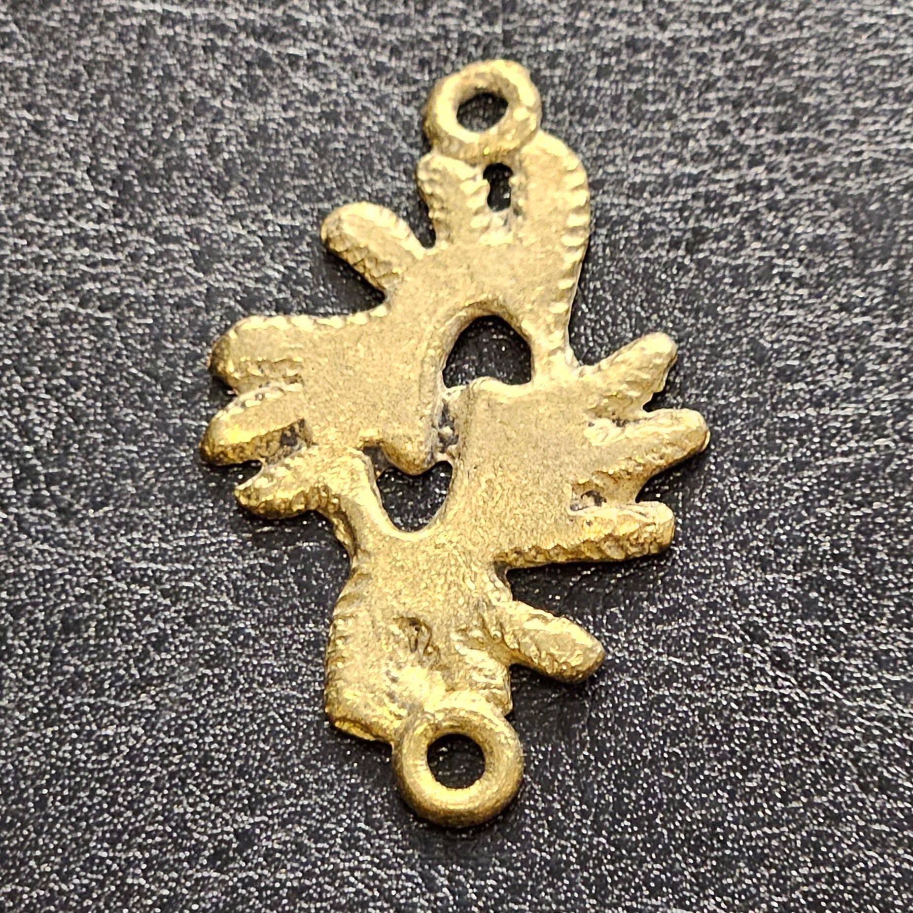 ashanti brass obi nka obi pendant side view