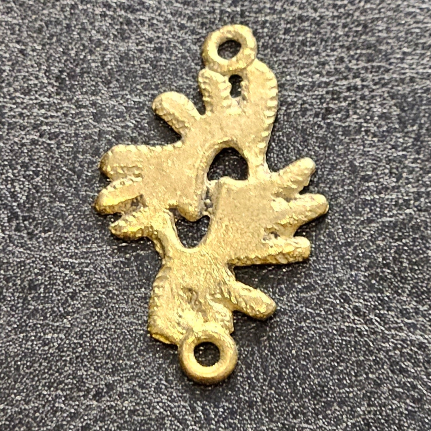 ashanti brass obi nka obi pendant close up detail