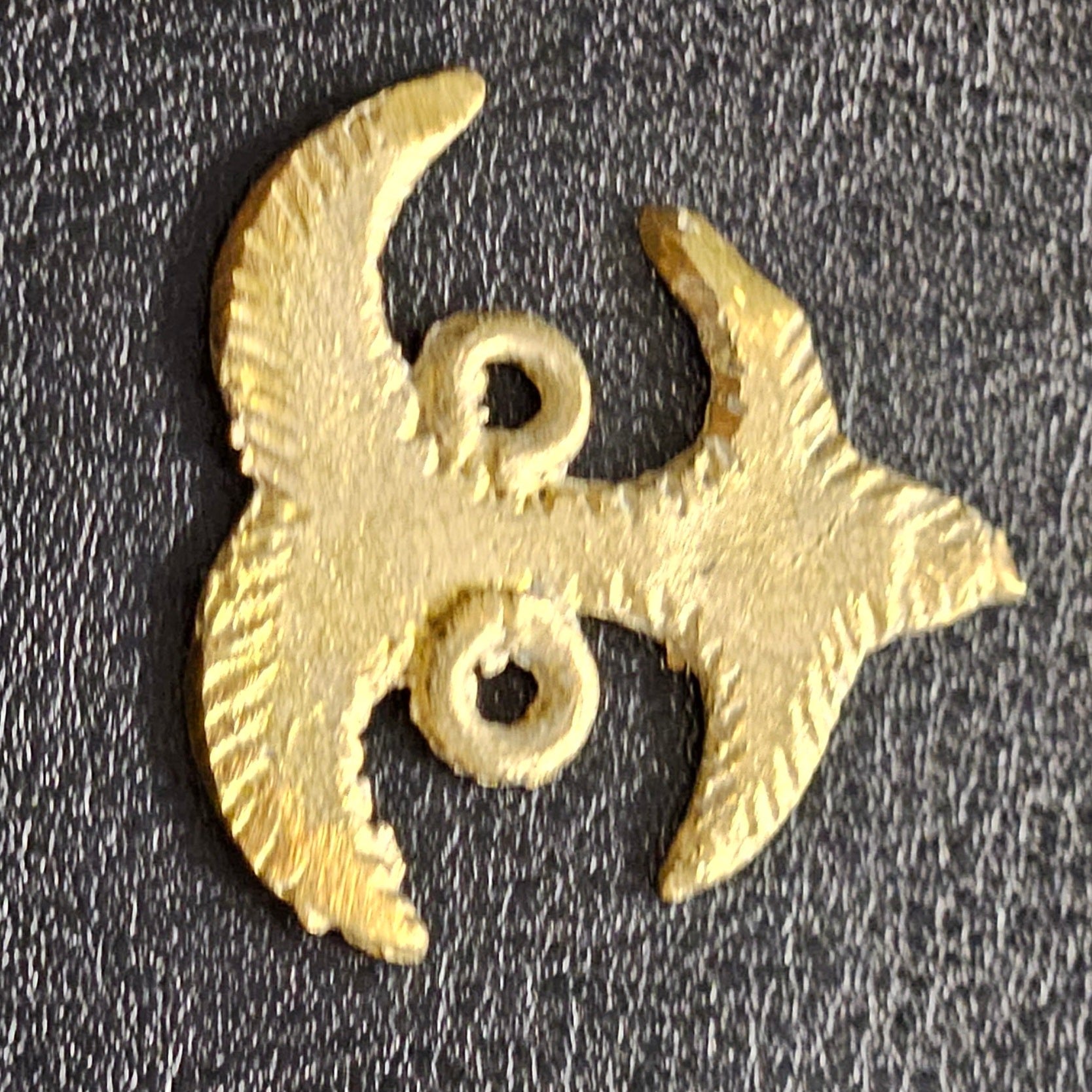 adinkra akokonan african asante brass pendant side view