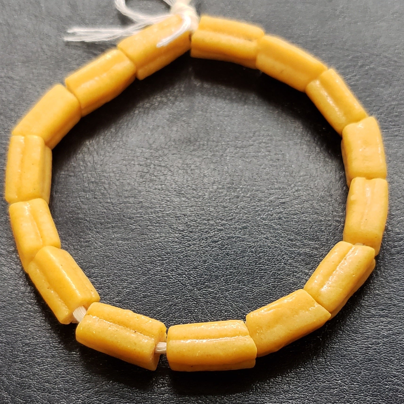 handcrafted krobo tube glass beads jewelry making gold orange strand top view Image 2: