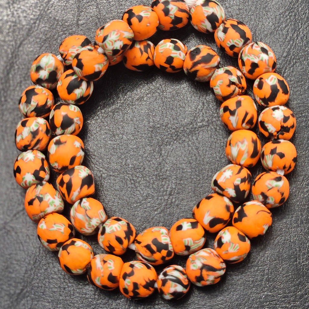 krobo tribe handcrafted african recycled glass beads side view