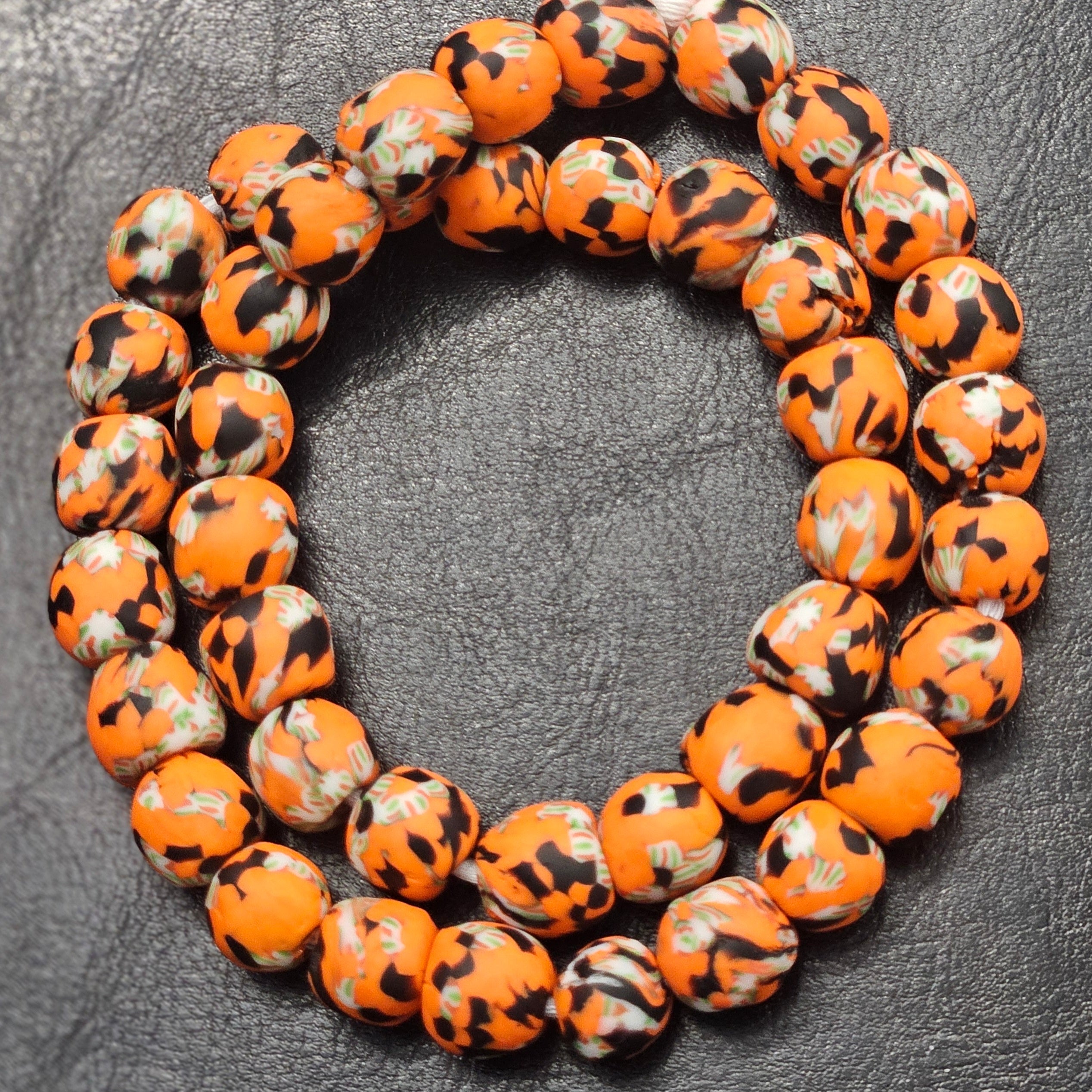 krobo tribe handcrafted african recycled glass beads side view