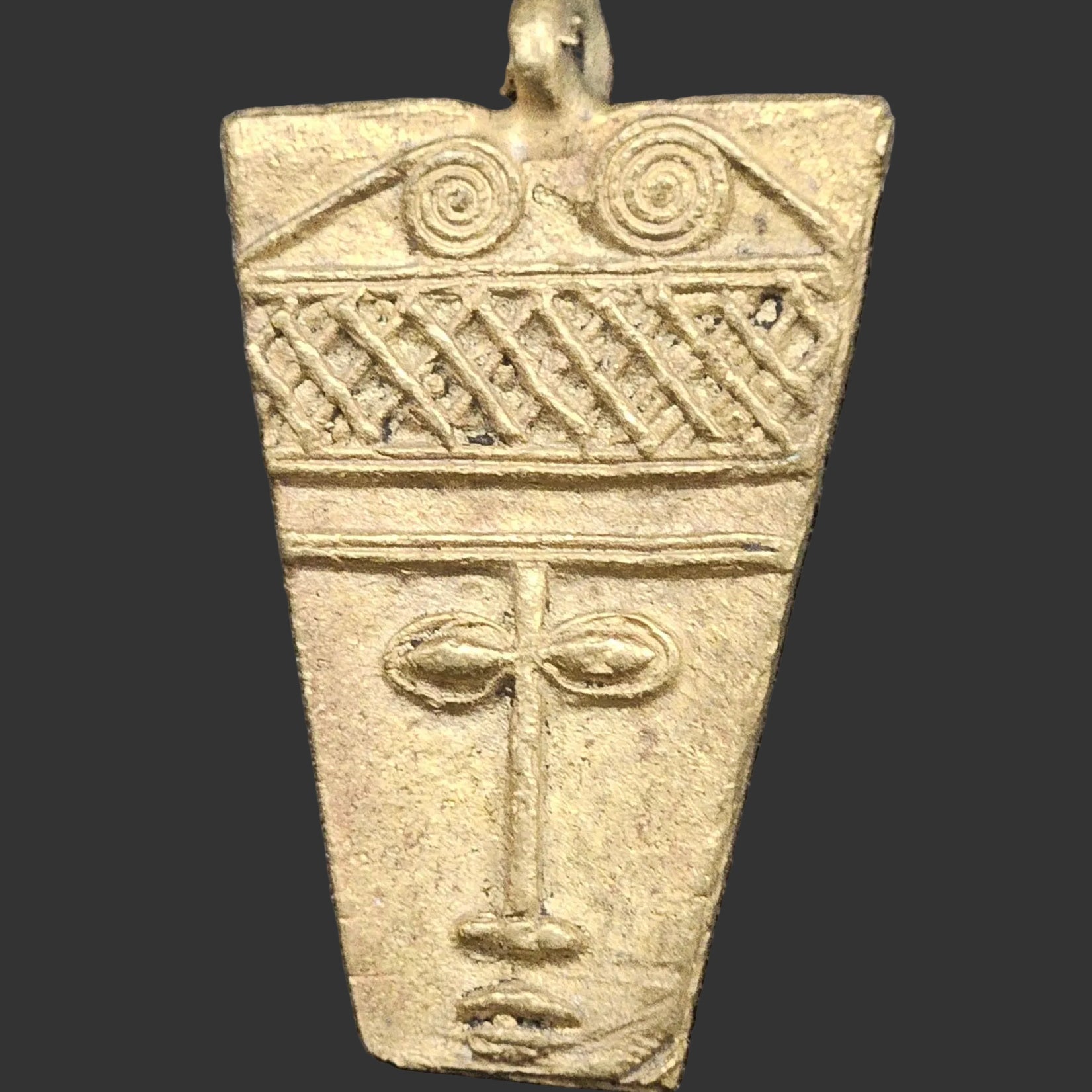 african brass ancient tribal mask pendant engraved detail view