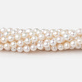 5-5.5mm Creamy White Petite Baroque Freshwater Pearls 15 inch 70 Beads