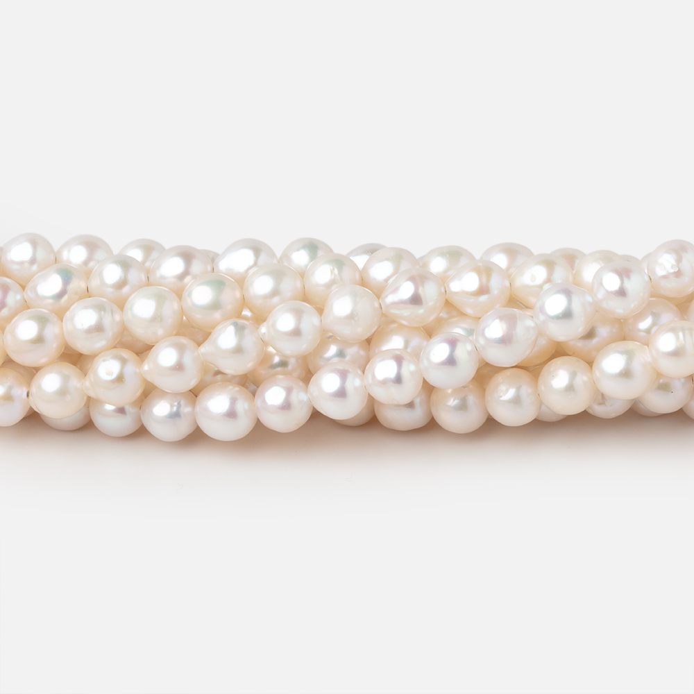 5-5.5mm Creamy White Petite Baroque Freshwater Pearls 15 inch 70 Beads