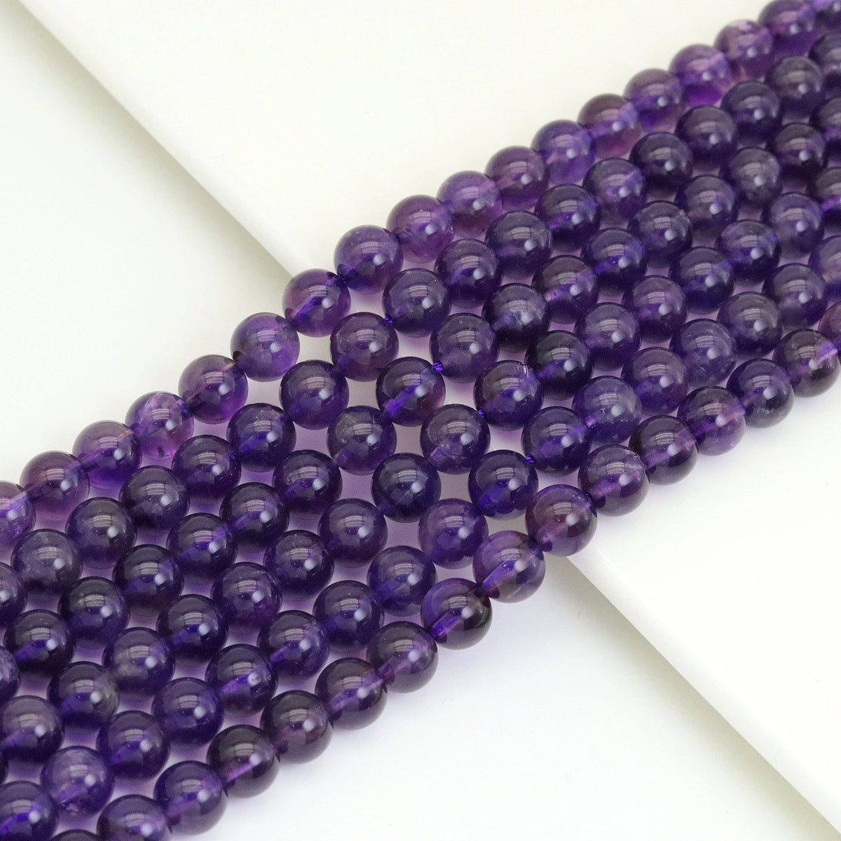 Amethyst Smooth Round Beads, 4–14mm, 15–16-Inch Strand