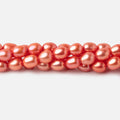 Coral Oval Freshwater Pearl Strand – 6 × 5mm, 15.5 Inch