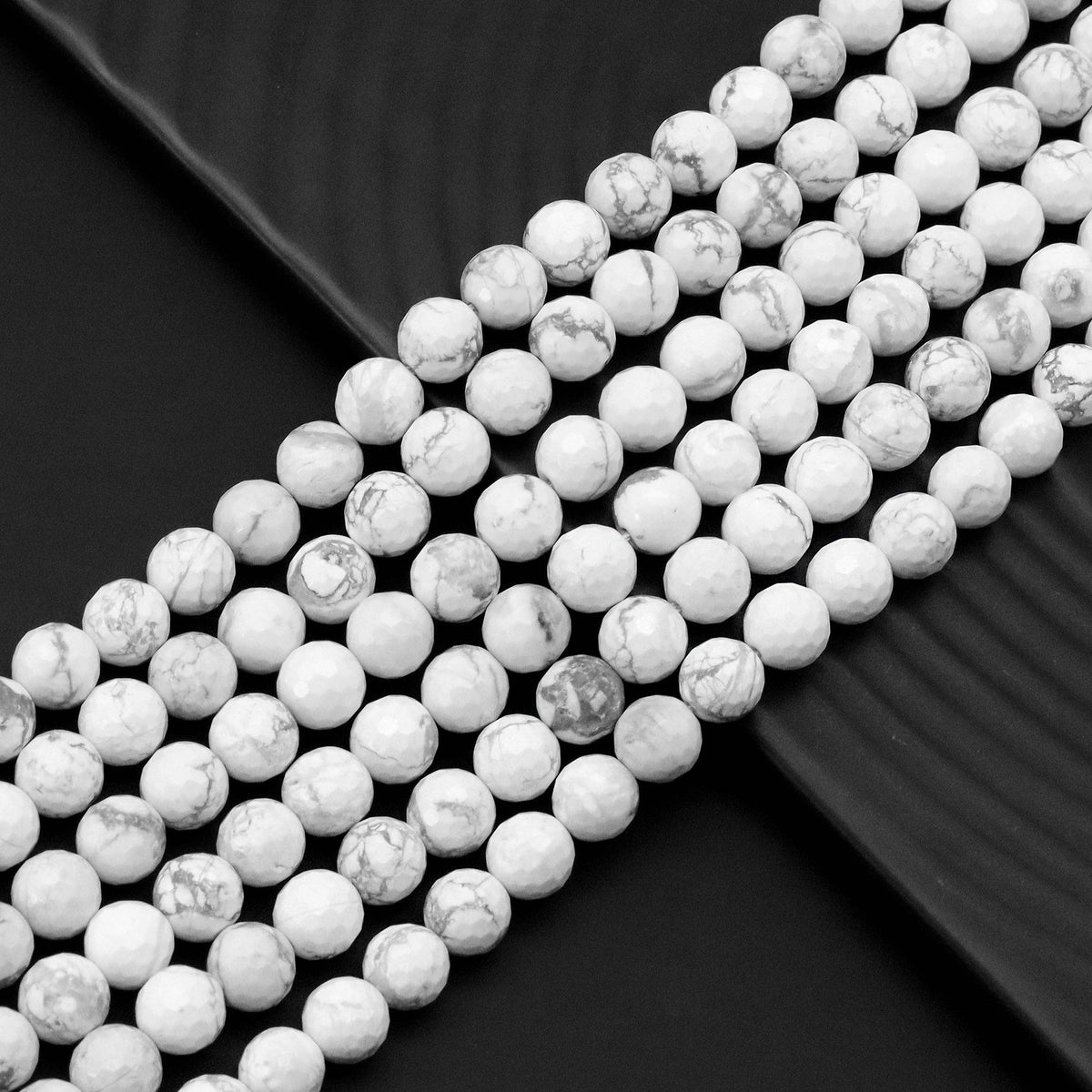 Howlite Faceted Round Bead Strand, 6mm–12mm, 15–16 Inches