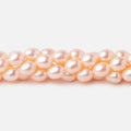 Peach Oval Freshwater Pearl Strand – 7 × 5mm, 15 Inch