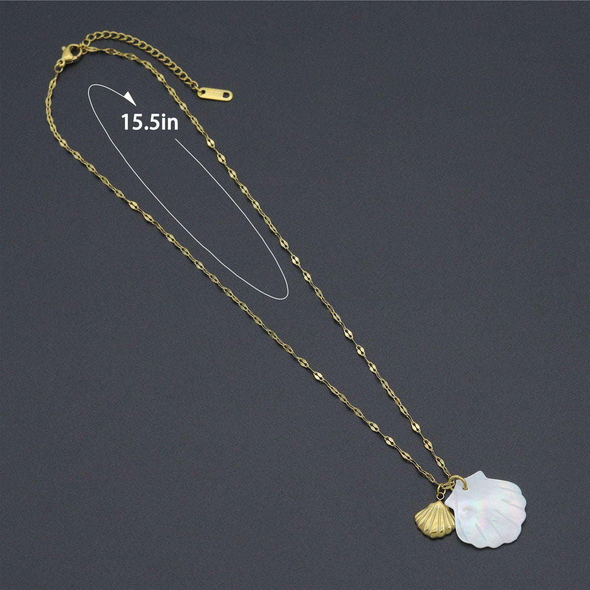Shell pendant necklace with a diagram labeled 15.5 inches