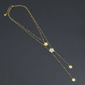 Layered gold-tone flower necklace with two chains and dangling flower charms