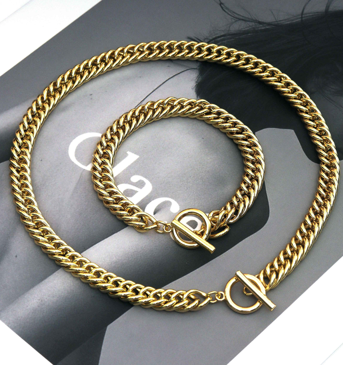 Gold-tone curb-link necklace and bracelet with round toggle clasps