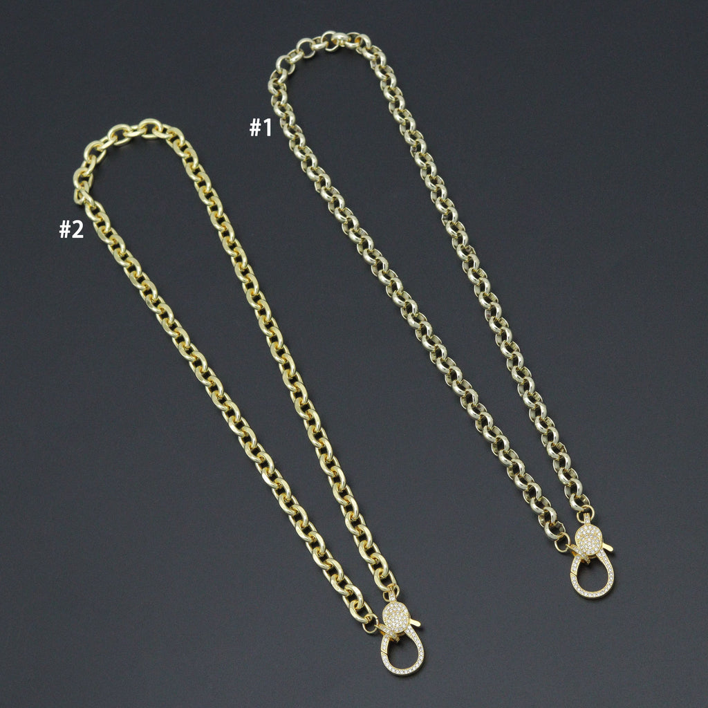 Two thick rolo-link necklaces with large clear-stone lobster clasps, labeled styles 1 and 2