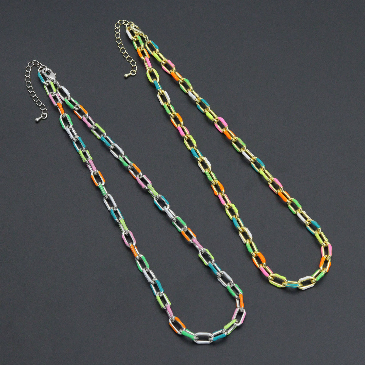 Gold-tone and silver-tone rectangular-link necklaces with multicolored enamel accents