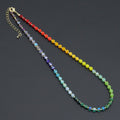 Rainbow cube bead necklace with small gold-tone spacers and a lobster clasp