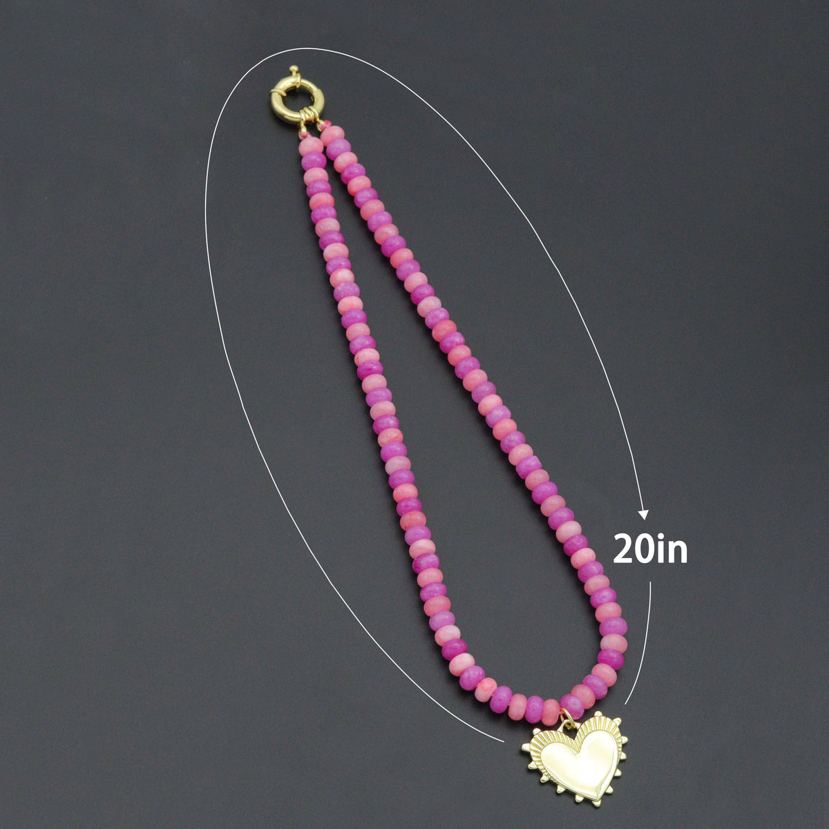Pink bead heart pendant necklace with a diagram labeled 20 inches