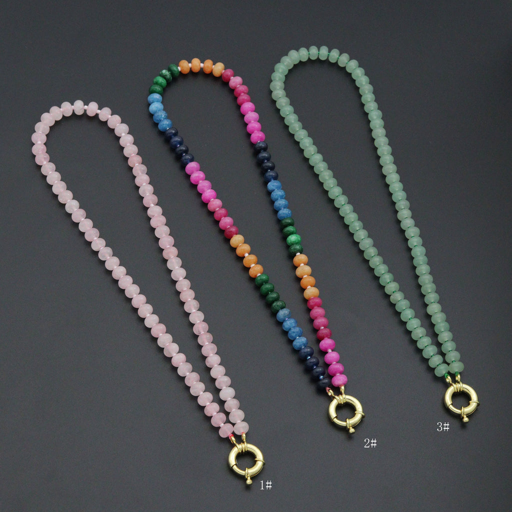 Pink, multicolored and green rondelle bead necklaces with gold-tone round clasps