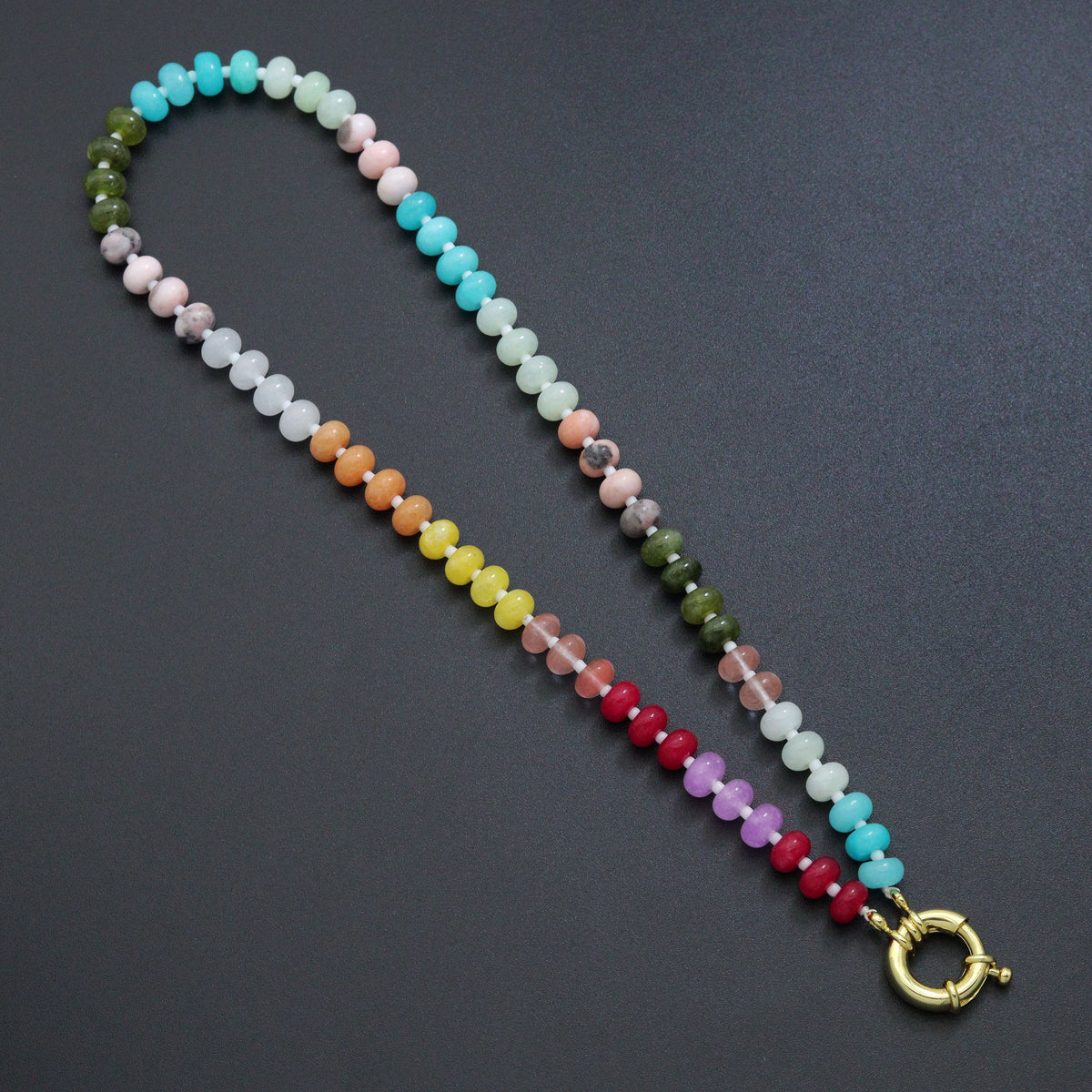 Rainbow rondelle bead necklace with a gold-tone round clasp