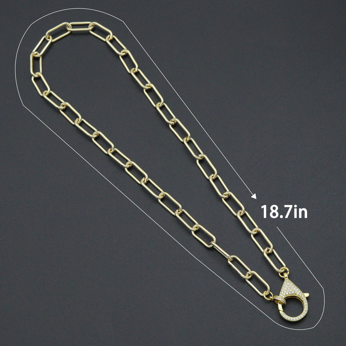 Gold-tone paperclip necklace with a diagram labeled 18.7 inches
