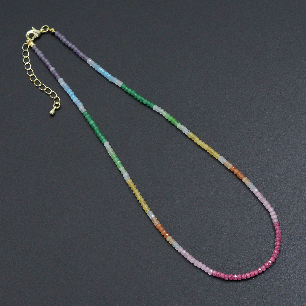 Rainbow rondelle bead necklace with color blocks and a gold-tone clasp and extender
