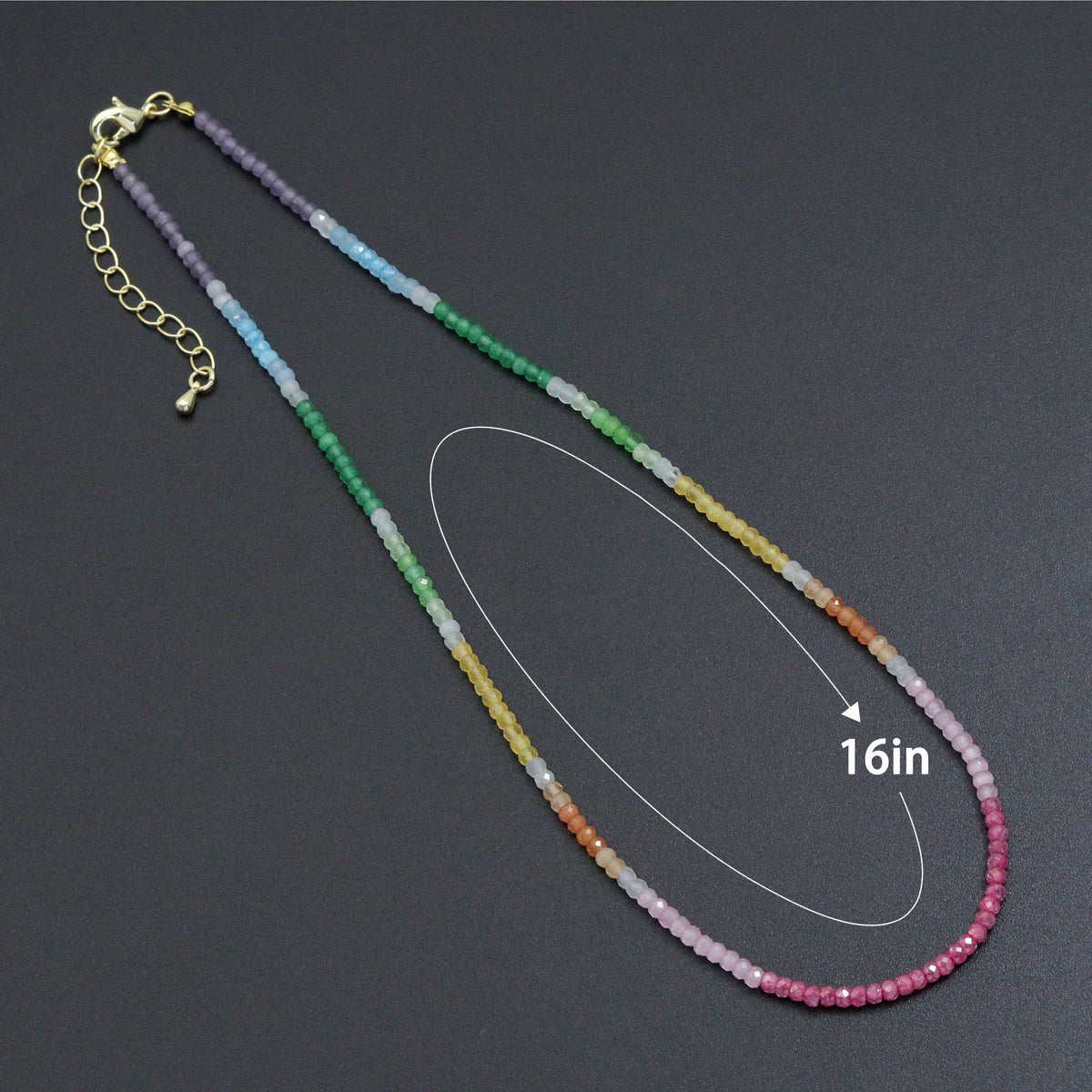 Rainbow rondelle bead necklace with a diagram labeled 16 inches