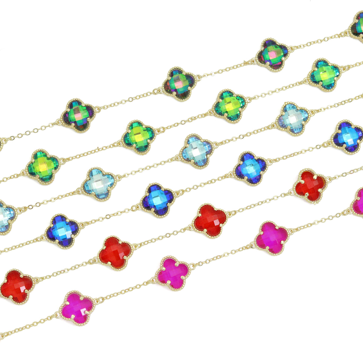 Close-up of faceted flower-shaped crystals linked by fine gold-tone chains