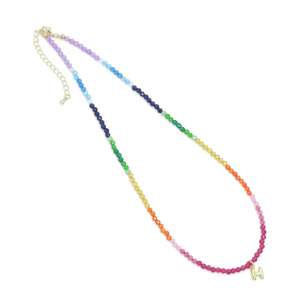 Rainbow faceted bead necklace with a gold-tone letter H charm and extender