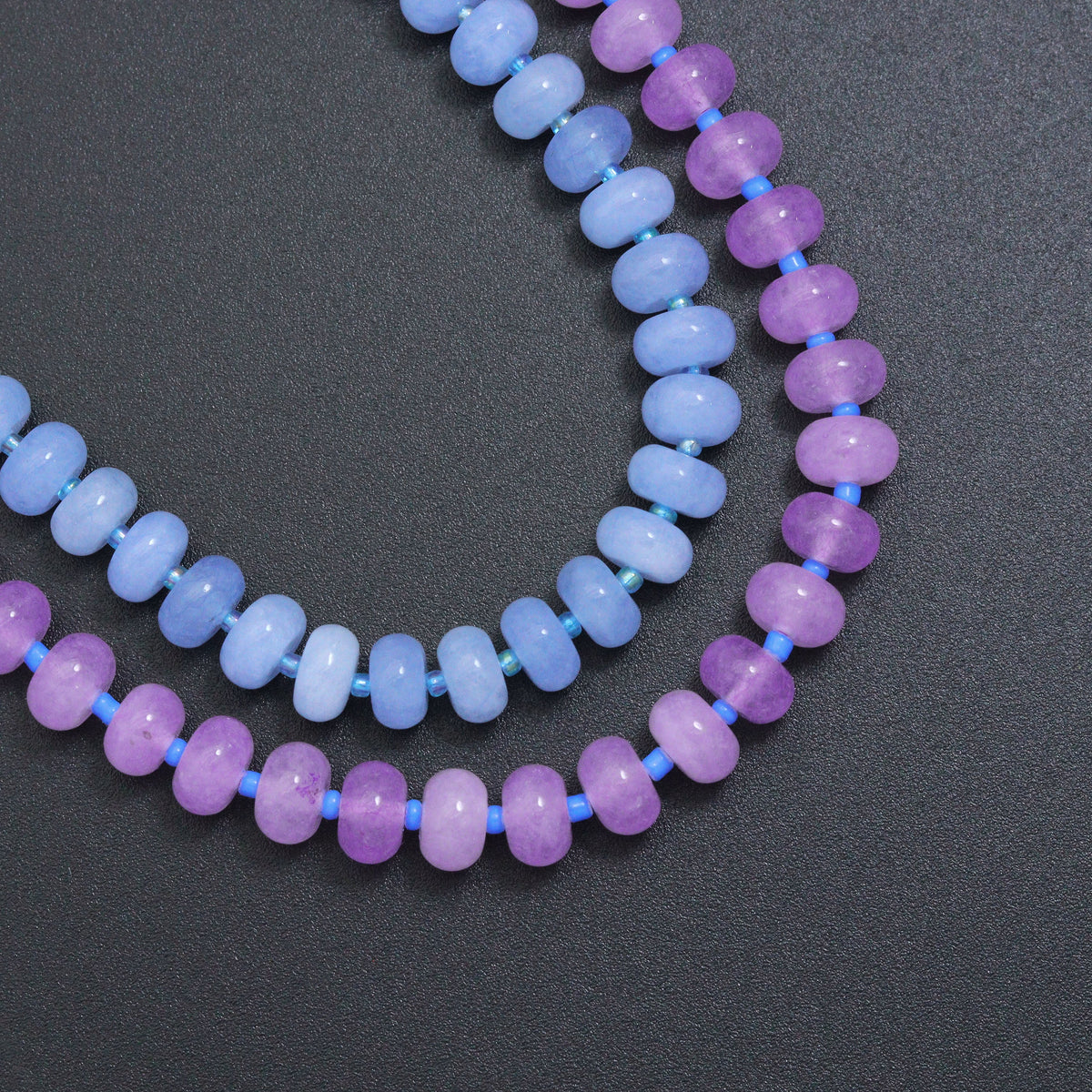 Close-up of the blue and purple necklace rondelle beads