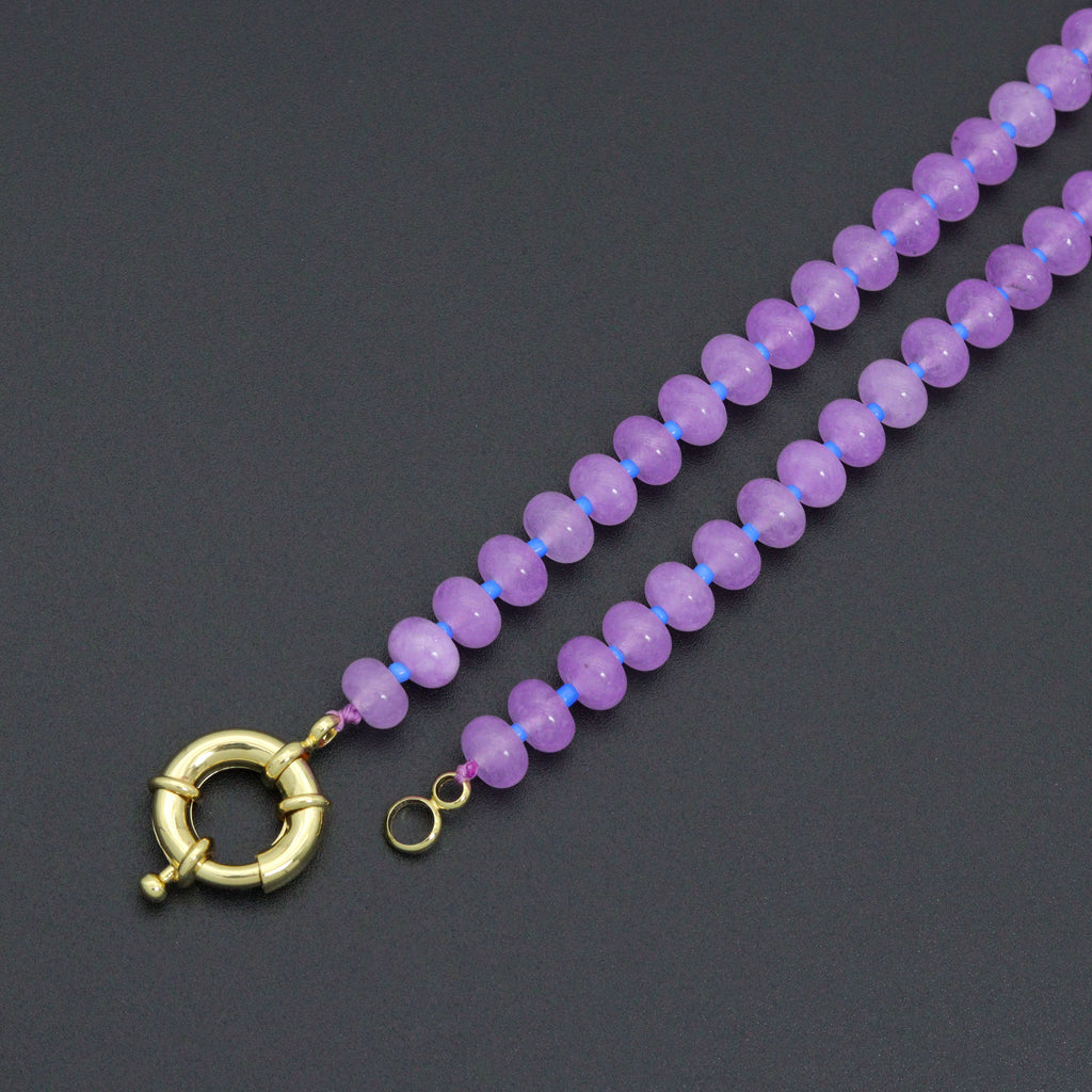 Close-up of the blue and purple bead necklace clasp and end rings