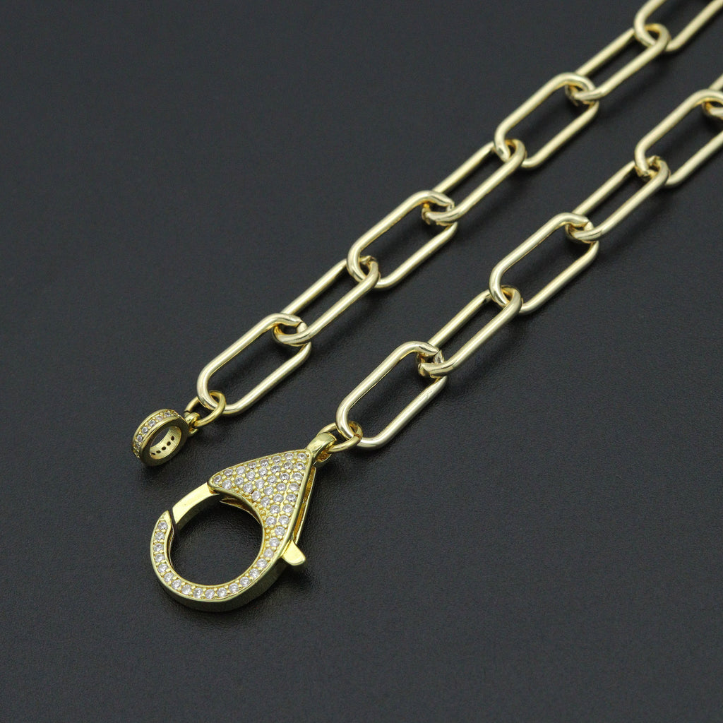 Close-up of the paperclip necklace clear-stone clasp and matching end ring