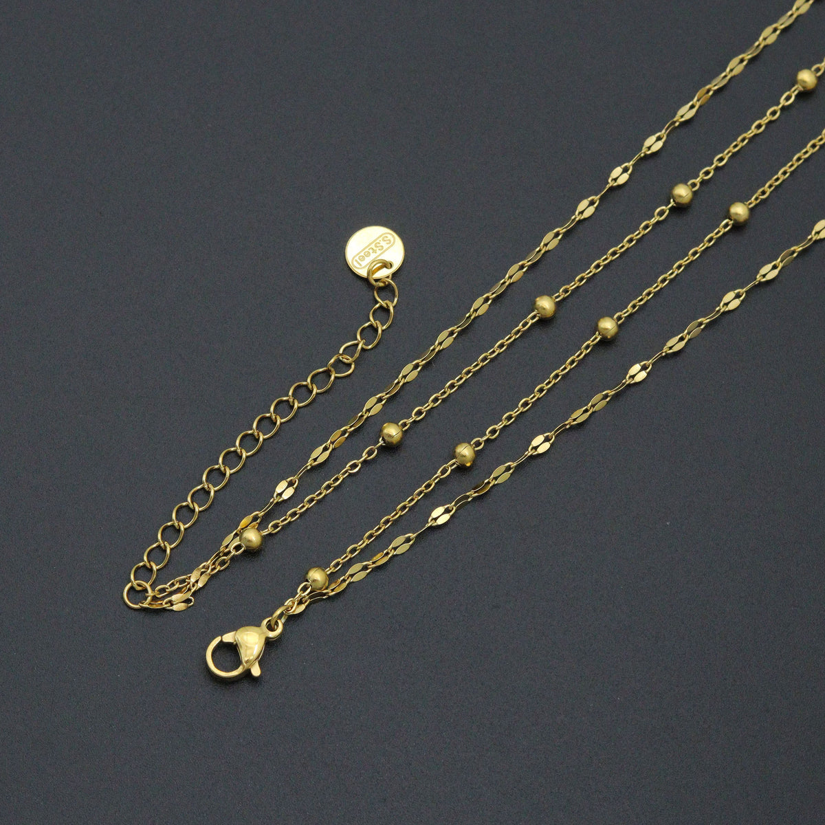 Layered flower necklace gold-tone lobster clasp, extender and beaded chain details