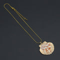 Scallop shell pendant with pink and cream markings and a gold-tone edge on a fine gold-tone necklace