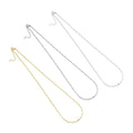 Three thin paperclip-link necklaces in gold-tone and silver-tone finishes