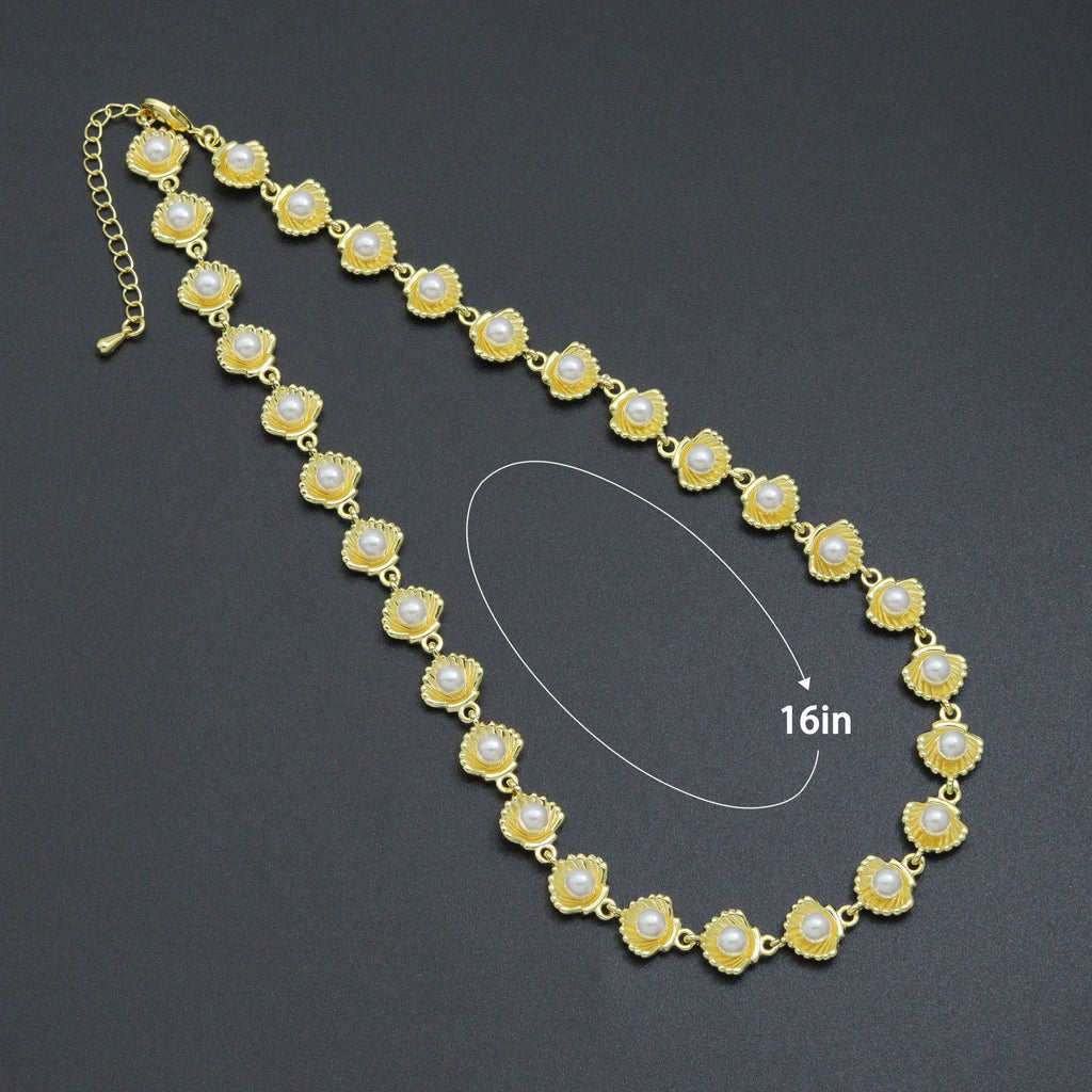 Pearl and shell-link necklace with a diagram labeled 16 inches
