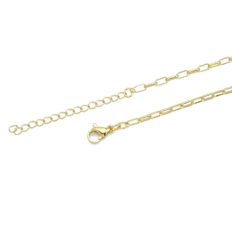 Close-up of a gold-tone paperclip necklace lobster clasp and extender chain
