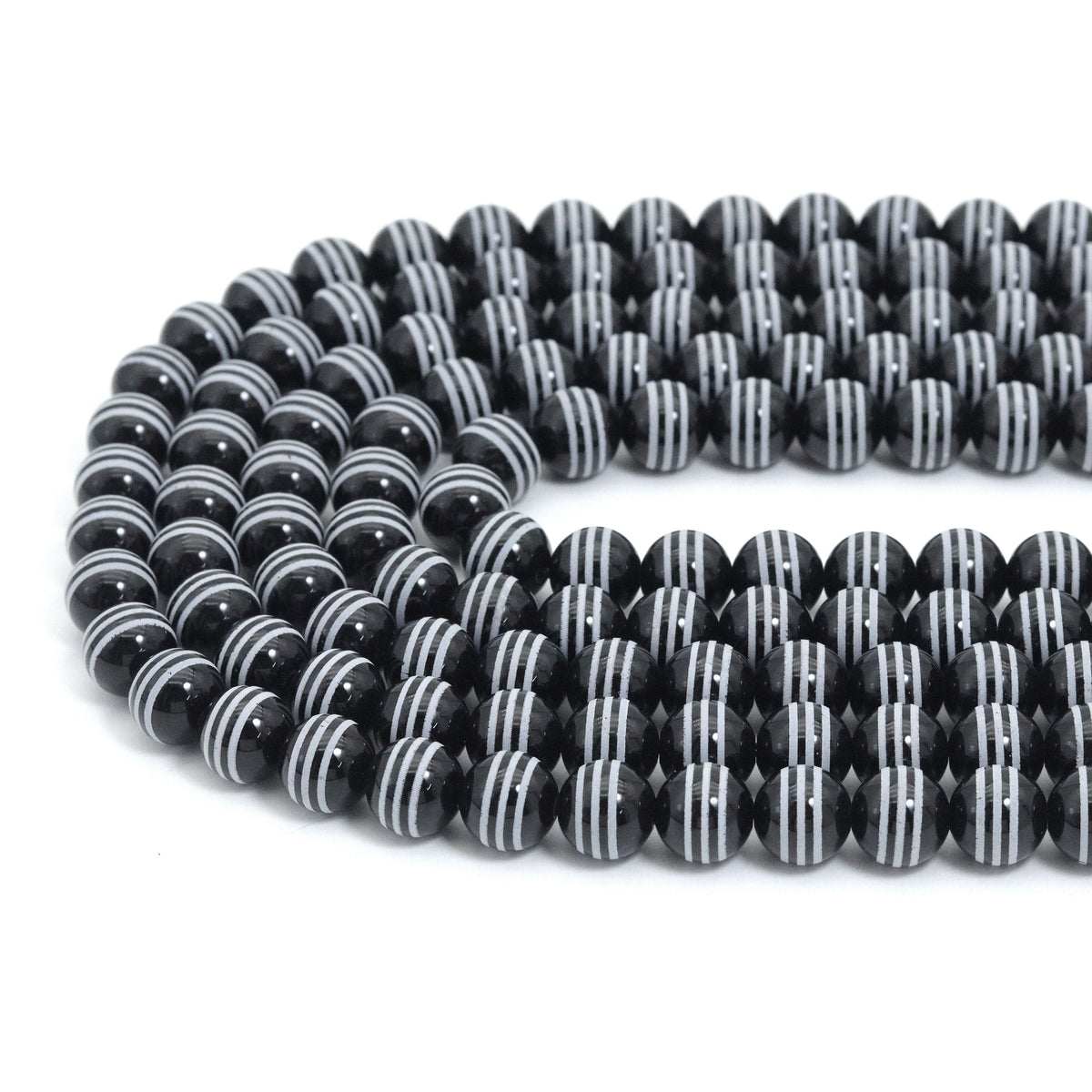Black Onyx Smooth Round Beads with White Stripes, 10–14mm, 15–16-Inch Strand