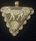 Triangular brass pendant with a raised leopard over an open lattice background, spiral discs around the border, and a textured top hanging loop