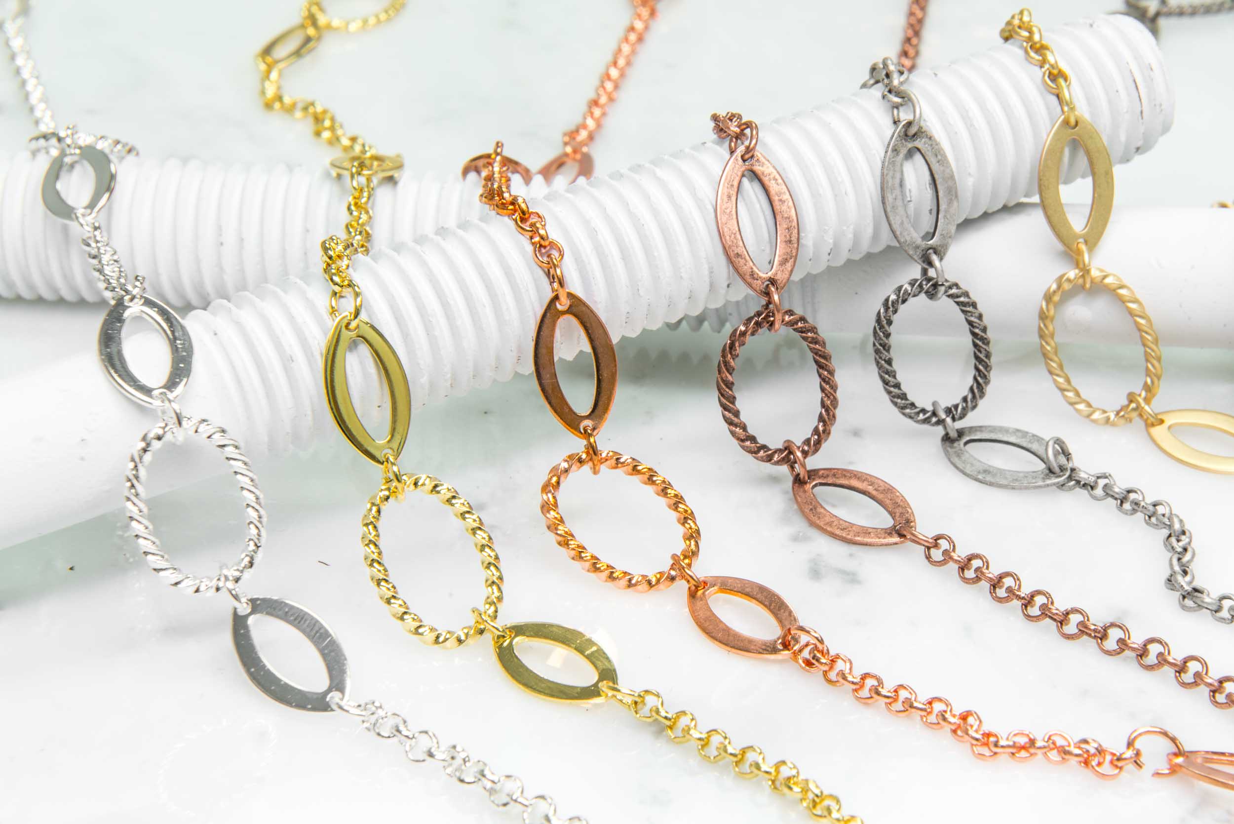 17mm x 12mm Oval Twisted Link Chain - Made of plated brass - Sold by the foot - Ch-50