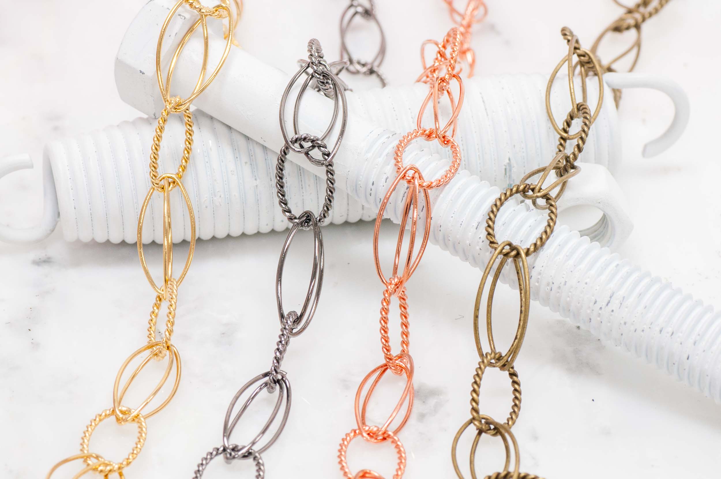 19mm x13mm Textured Oval with Two 24 x11mm Plain Oval Links Cable Chain sold by The Foot - CH 814