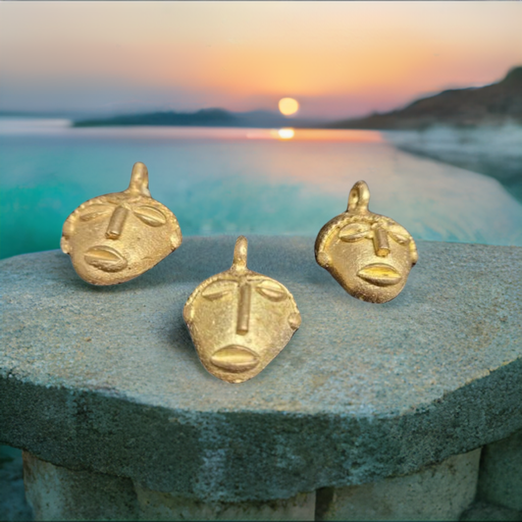 3 african brass small tribal mask pendants sunset background view 5
